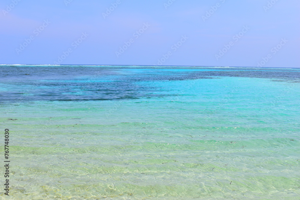 Maafushi Maldives - February 2022 : Beautiful turquoise waters on a hot sunny relaxing day. 