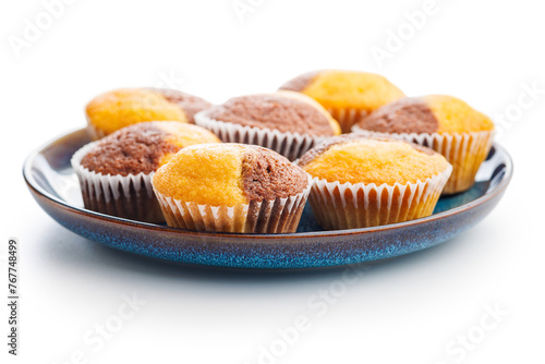 Close Up of a Muffins on plate isolated on white background.