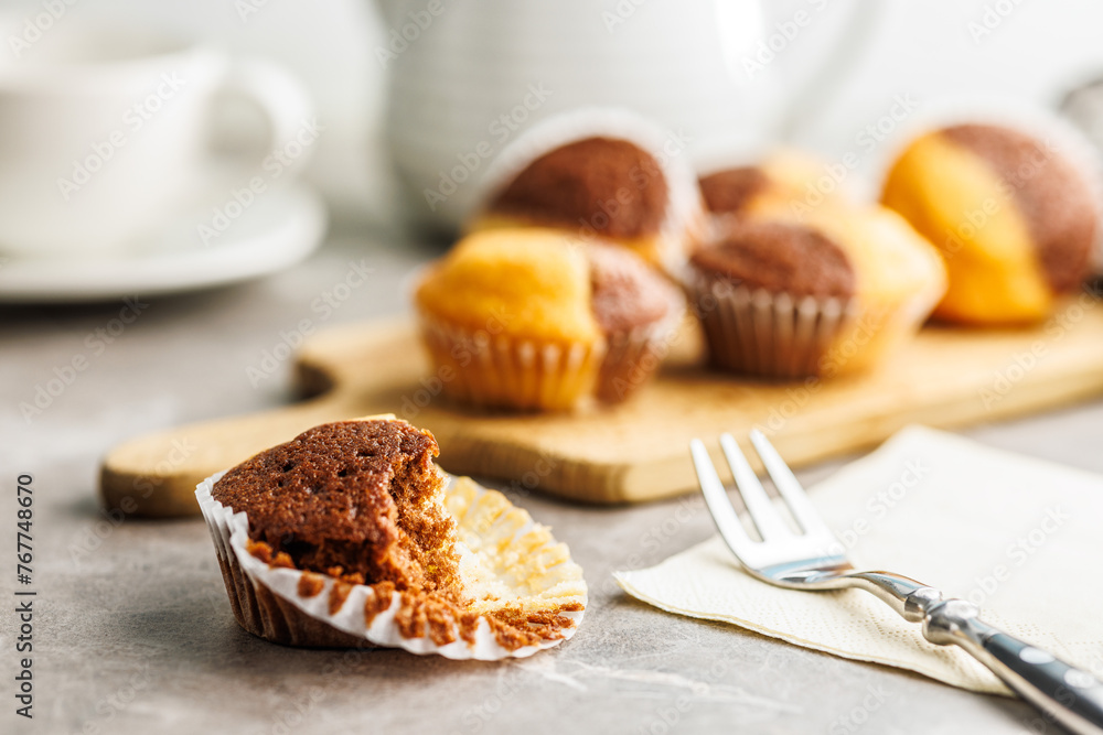 Close Up of a Muffins on kitchen table Close Up of a Muffins on kitchen table