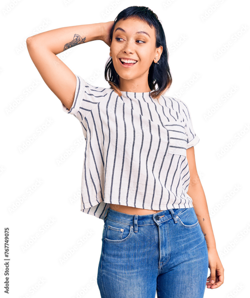 Young woman wearing casual clothes smiling confident touching hair with hand up gesture, posing attractive and fashionable Young woman wearing casual clothes smiling confident touching hair with hand up gesture, posing attractive and fashionable