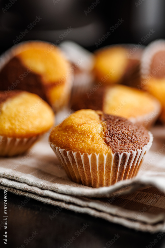 Close Up of a Muffins on black table. Close Up of a Muffins on black table.