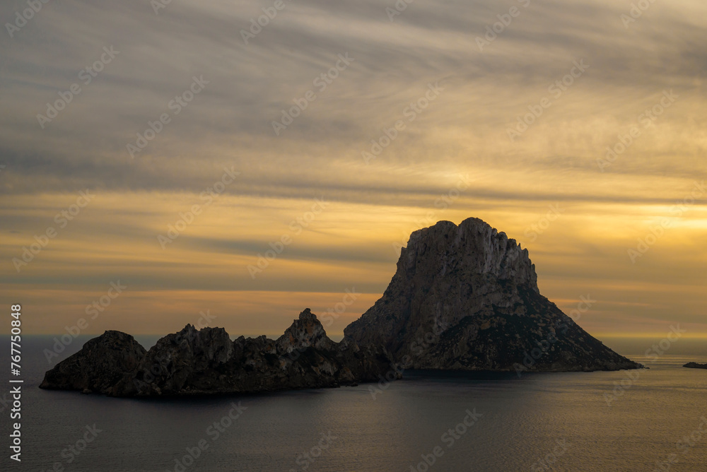 Sunset over Es Vedra and Es Vendrell little islands near Cala D´Hort beach, Sant Joan de Sa Talaia, Ibiza, Balearic Islands, Spain