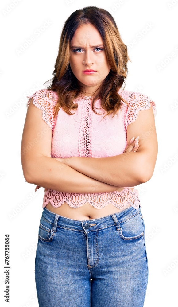 Young beautiful caucasian woman wearing casual clothes skeptic and nervous, disapproving expression on face with crossed arms. negative person. Young beautiful caucasian woman wearing casual clothes skeptic and nervous, disapproving expression on face with crossed arms. negative person.