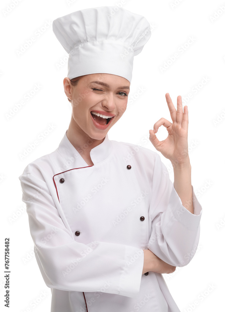 Happy woman chef in uniform showing OK gesture on white background Happy woman chef in uniform showing OK gesture on white background