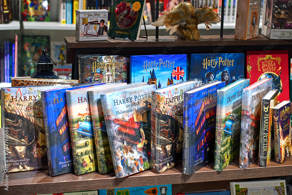 Fototapeta premium Minsk, Belarus. Mar 3, 2024. Harry Potter books on display, magical collection of Harry Potter books neatly arranged on store shelf. Novels written by J.K. Rowling and other authors.
