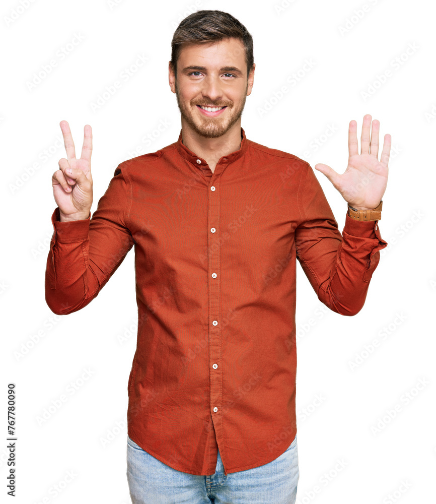 Naklejka premium Handsome caucasian man wearing casual clothes showing and pointing up with fingers number seven while smiling confident and happy.
