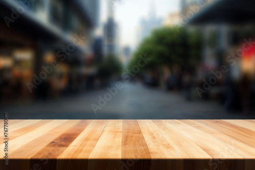 An empty wooden table in front of a blurred city street. High quality photo