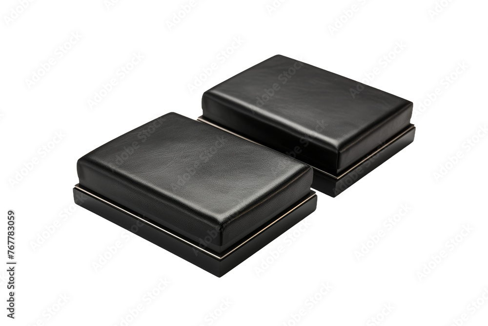 The Towering Alliance of Black Leather Boxes. On a White or Clear Surface PNG Transparent Background. The Towering Alliance of Black Leather Boxes. On a White or Clear Surface PNG Transparent Background.
