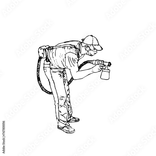 A man working with a paint sprayer. Street graffiti artist. Chemical processing, disinfection