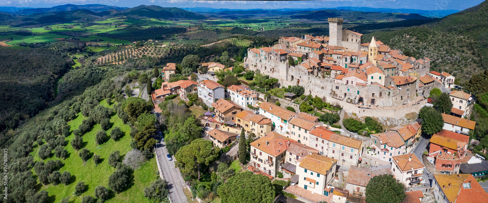 Italy travel and landmarks. Capalbio - charming small traditional top hill village (borgo) in Tuscany. Grosetto province. considered one of the most beautiful villages of Italy. aerial paniramic view