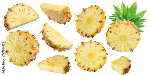 Set of ripe pineapple slices isolated on white background. File contains clipping paths.