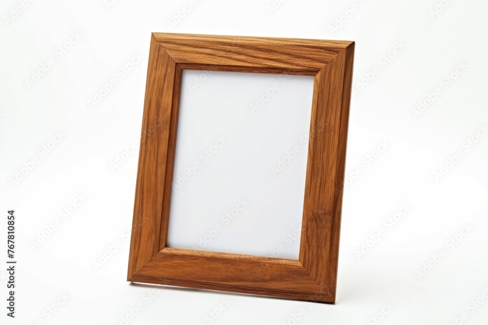 Desktop photo frame Vertical standing brown wooden picture frame on white background Desktop photo frame Vertical standing brown wooden picture frame on white background