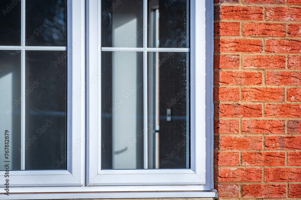 Fototapeta premium Window view of construction building site in england uk.