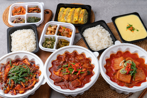 Fototapeta Naklejka Na Ścianę i Meble -  Korean food, spam, pork, spicy, red pepper paste, stew, squid, stir-fry, side dishes, rice, egg roll, beans, perilla leaves, seaweed