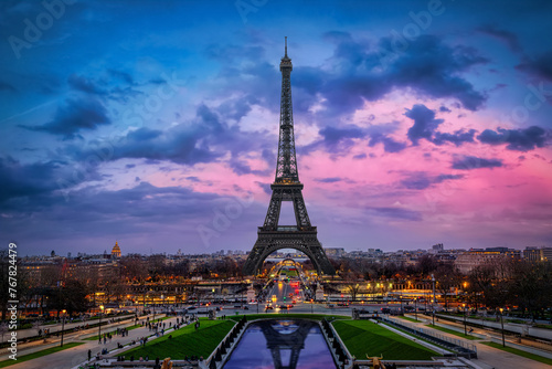 Beautiful spring dusk view of the Eiffel Tower and skyline of Paris, France © moofushi