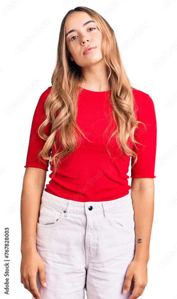 Fototapeta premium Young beautiful blonde woman wearing casual clothes relaxed with serious expression on face. simple and natural looking at the camera.