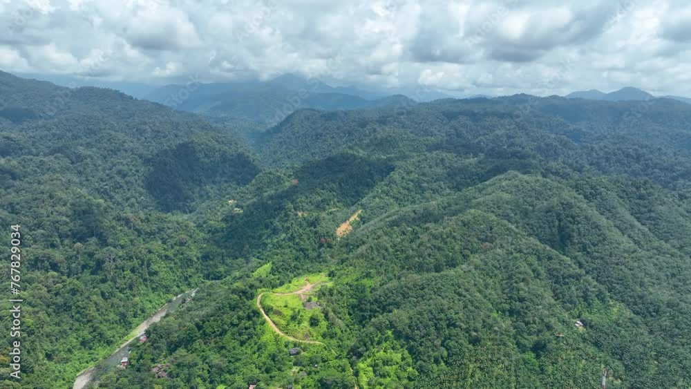 Indonesian nature, mountains and hills of lush green rainforests. Aerial Indonesian nature, mountains and hills of lush green rainforests. Aerial