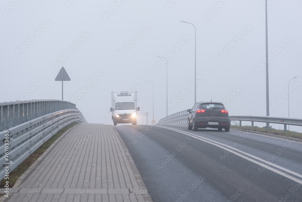 MISTY WEATHER - Meteorology phenomenon over the asphalt road
MISTY WEATHER - Meteorology phenomenon over the asphalt road