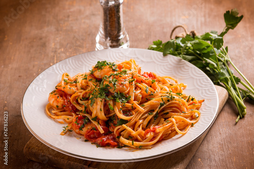 linguine with shrimp tomato sauce and parsley