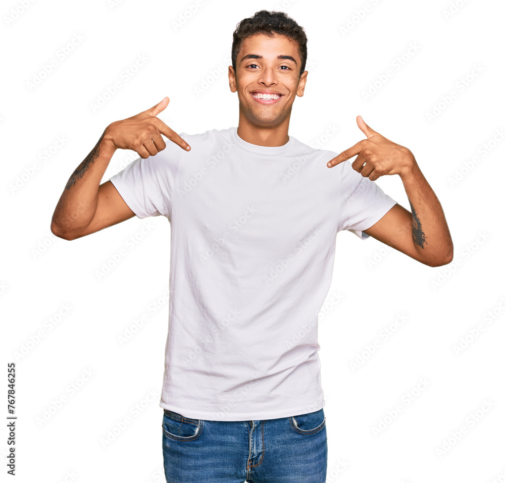 Young handsome african american man wearing casual white tshirt looking confident with smile on face, pointing oneself with fingers proud and happy. Young handsome african american man wearing casual white tshirt looking confident with smile on face, pointing oneself with fingers proud and happy.