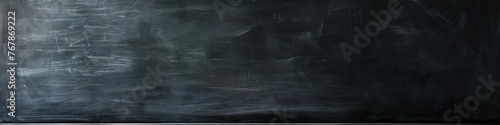 Chalk rubbed out on blackboard background, panoramic banner
