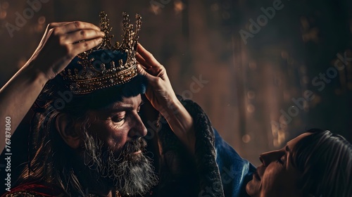 a person places the crown on the head of a king, royal succession, king coronation, transition of kingdom, prince comes to rule