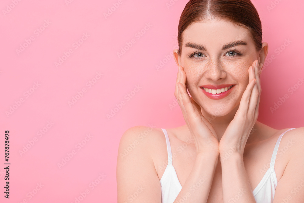 Portrait of smiling woman on pink background. Space for text Portrait of smiling woman on pink background. Space for text