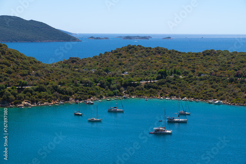 Beautiful incredible landscape with the sea, yachts, boats against the background of the Turkish Mediterranean coast on a sunny day, Kas.