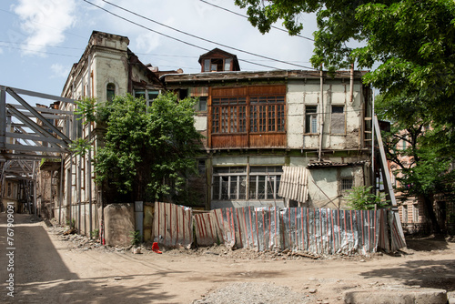 Schilderij op canvas Dilapidated buildings in the Old Town neighborhood of Tbilisi, Republic of Georgia