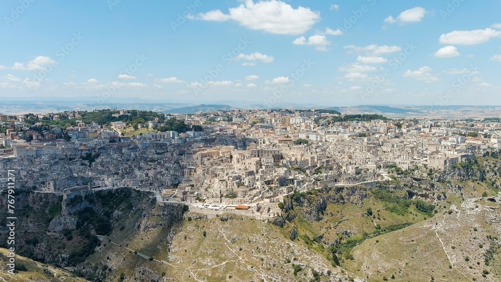 Matera, Italy. The old part of the city is carved into the rock and is a UNESCO World Heritage Site. Summer day, Aerial View