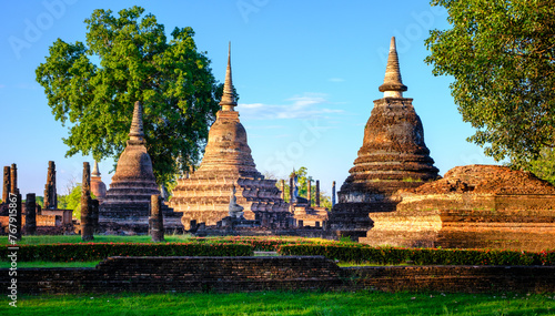 Wat Mahathat Sukhothai historical park at sunset, UNESCO site, World heritage site of Thailand. Travel destination of Thailand.