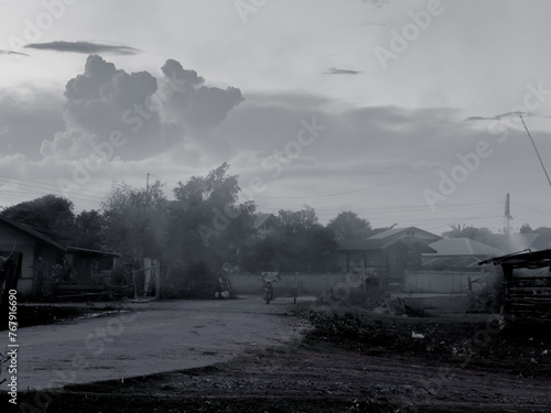 a black and white photo of a street