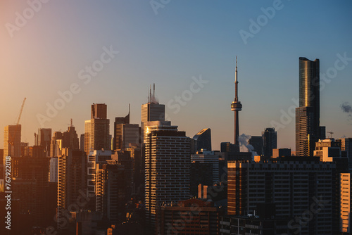 sunset over Toronto city downtown skyline  sunrise over CN Tower and skyscrapers of financial district Canada