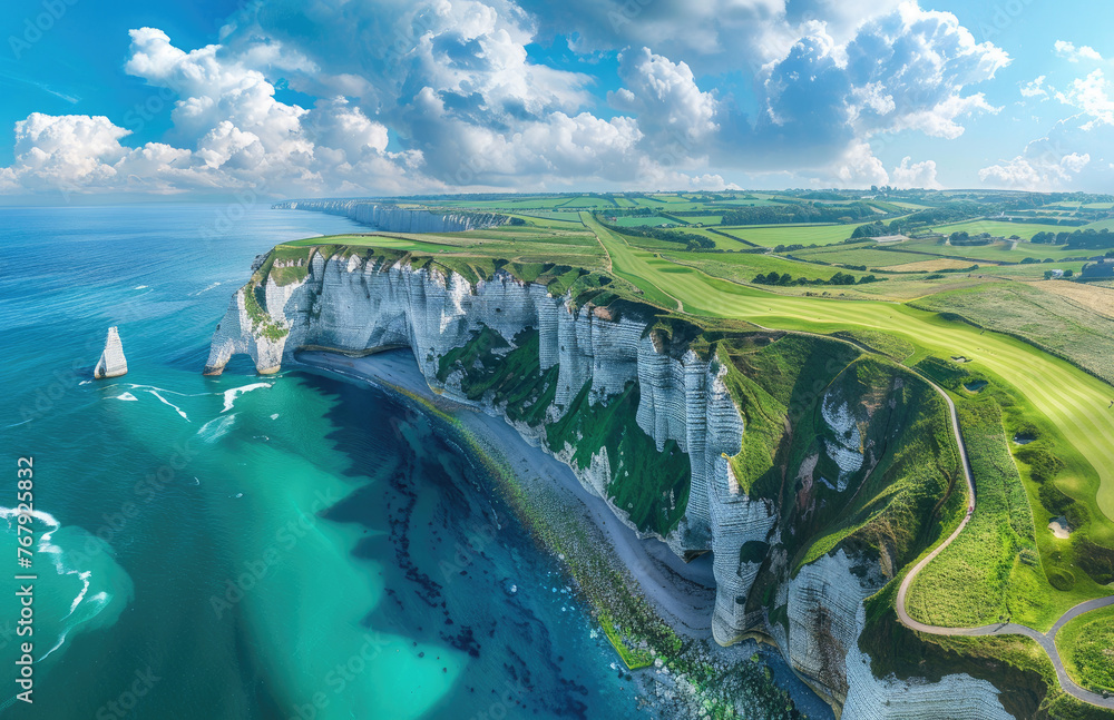 A panoramic view of the lush green golf course nestled on white cliffs overlooking blue sea, with the iconic tall rock arches - obrazy, fototapety, plakaty 