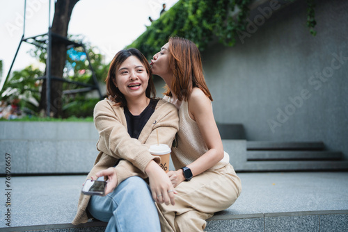 Business asian woman casual talking outdoor city building happy coffe break time