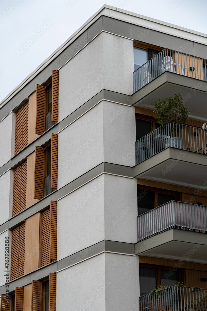 Fototapeta premium Exterior of a modern apartment complex with small balconies