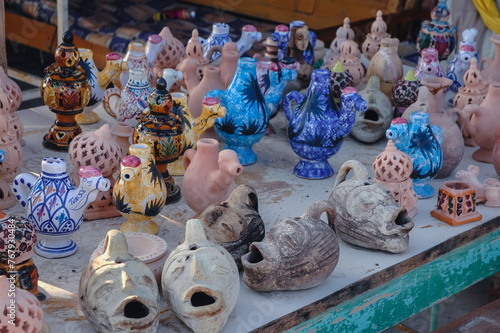 Souvenir stall on a road across Chott El Jerid endorheic salt lake in southern Tunisia photo