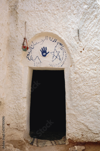 Signs in traditional Berber cave dwelling near Matmata city, Kebili Governorate, Tunisia photo