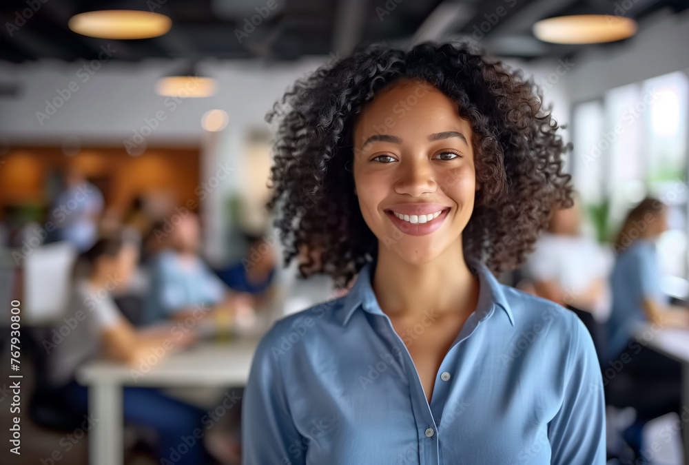African American Woman smiling in Office Space African American Woman smiling in Office Space