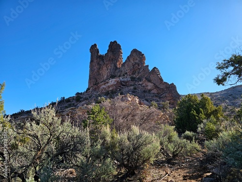 Rock formations against the bright blue sky. Teec Nos Pos Canyon, Arizona