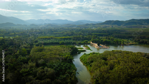 Aerial view tropical rainforest green tree with river ecology enveronment photo