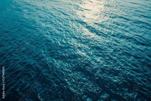 Serene ocean seascape from above, abstract blue water surface with gentle waves, nature background photo © furyon