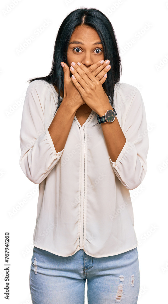 Young african american woman wearing casual clothes shocked covering mouth with hands for mistake. secret concept. Young african american woman wearing casual clothes shocked covering mouth with hands for mistake. secret concept.