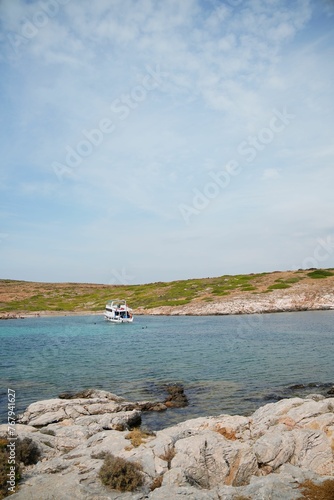 Boat in Akvaryum Bay in Canakkale, Bozcada photo