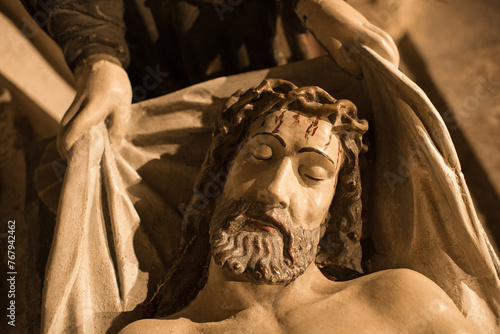 Statue of Jesus Christ lying in the shroud photo