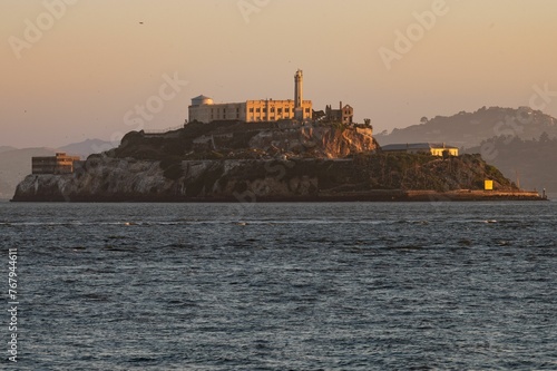 Fototapeta Naklejka Na Ścianę i Meble -  Scenic image of Alcatraz Prison in San Francisco during a beautiful sunrise