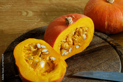 Sliced hokkaido pumpkin on cutting board