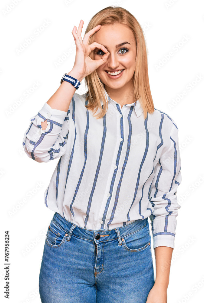 Beautiful caucasian woman wearing casual clothes doing ok gesture with hand smiling, eye looking through fingers with happy face. Beautiful caucasian woman wearing casual clothes doing ok gesture with hand smiling, eye looking through fingers with happy face.