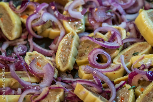 Swabian Maultaschen with Onions cooked in pan in close up view
