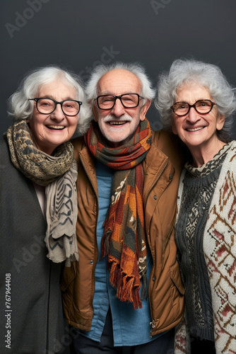 Portrait of happy three senior friends in studio. © AI_images